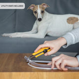 pet parent using utility knife for pet wire protector sizing